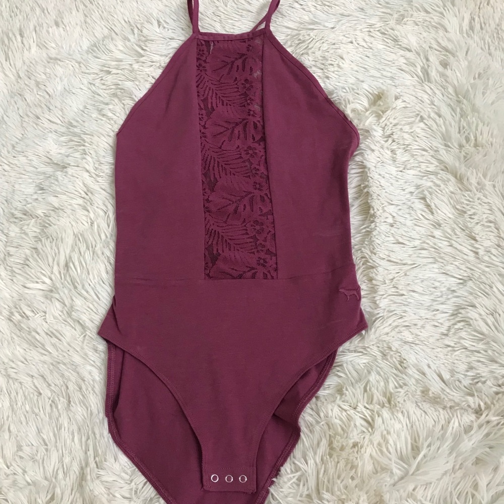 a magenta lace bodysuit from pink